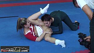 Hey, watch this cute teen get orally satisfied by her wrestling buddy after a hot match