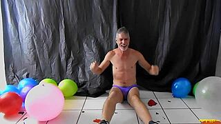 richard lennox plays with balloons and masturbates his big cock