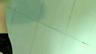 E Trang Nguyen chatting on Bigo while bathing