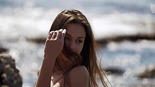 Demi fray teases with striptease and ripped clothes on the nude beach