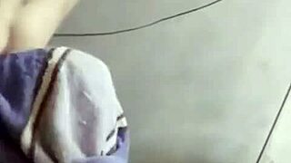 E Trang Nguyen chatting on Bigo while bathing