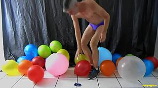 richard lennox plays with balloons and masturbates his big cock