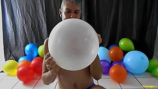 richard lennox plays with balloons and masturbates his big cock