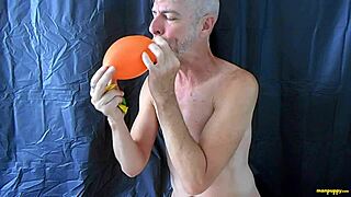 richard lennox plays with balloons and masturbates his big cock