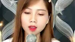 pretty asian girl gives blowjob on webcam?