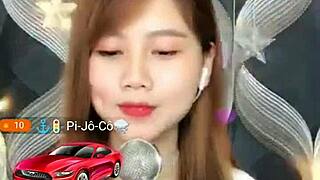 pretty asian girl gives blowjob on webcam?