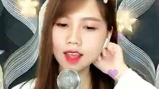 pretty asian girl gives blowjob on webcam?