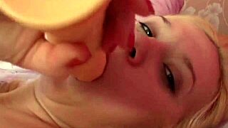 Hot blonde masturbates pussy and sucks dildo