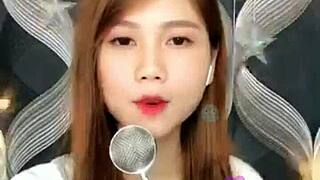 pretty asian girl gives blowjob on webcam?