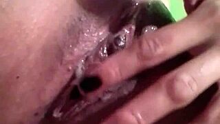 She touches her wet pussy during striptease