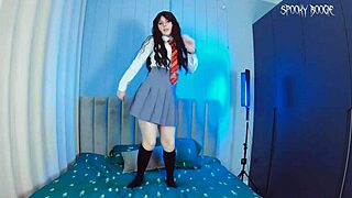 Watch this redhead masturbate, fingering pussy in fishnets and shoes