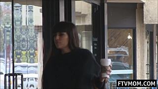 Busty milf drinks coffee and flash on the street
