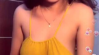 Girl In Yellow Dress Shows Off Big Tits Seductively