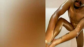 oiled guy deepthroats dildo with gagging