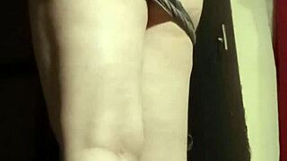 I'm this busty camgirl in grey, fingering my big ass so horny for sex.