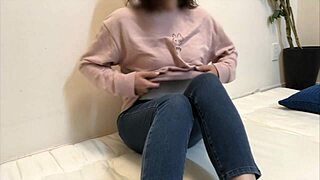 Young japanese amateur strips tight jeans and masturbates as usual