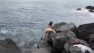 unexpected cumshot on the face of a nudist on the beach cuckold husband lover marked her