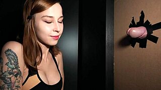 amateur redhead teen explores gloryhole with a massive dick in a wild toilet scene.