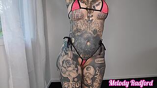 trying on a sheer micro bikini for a steamy homemade haul with fake tits