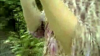 Oh man, this wild British girl is flashing her pussy outdoors while fingering herself! 🌳🍑