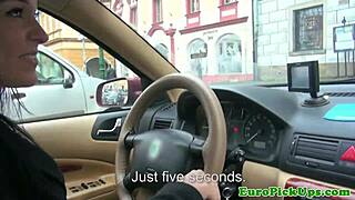 Flashing in a taxi, this brunette takes cash for public fun