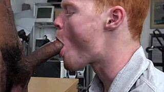 Redhead guy pleasures monster black dick at work