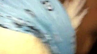 The ebony woman performs a sucking action on the big black cock