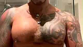 Tattooed Viktor Rom Strokes Huge Latino Cock in Bathroom