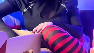 Naughty Mavis digs into her toy box for fun