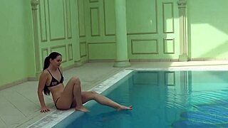 Kittina Ivory undresses in the swimming pool