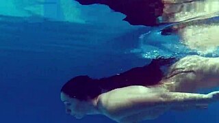 Kittina Ivory undresses in the swimming pool