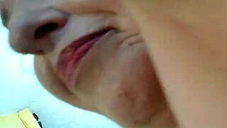 Mature goddess teases with smoking kisses and titty fuck