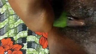 Cyndy Blackslave Stuffs Her Tight Ebony Pussy with Cucumber Until Squirting