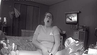 curious teen skips homework to finger herself watching porn on hidden cam.