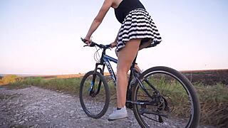 Flashing tight ass on a bicycle, upskirt caught on cam!