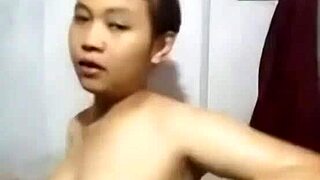 Khmer girl bathes in shower