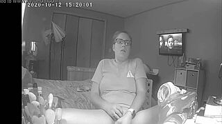 curious teen skips homework to finger herself watching porn on hidden cam.