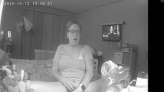curious teen skips homework to finger herself watching porn on hidden cam.