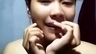 Khmer girl bathes in shower