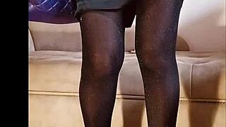 Amateur in shiny pantyhose pees in a softcore fetish scene.