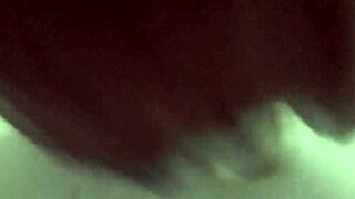 In the shower, he pleasures himself with a dildo