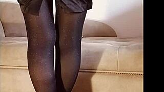 Amateur in shiny pantyhose pees in a softcore fetish scene.