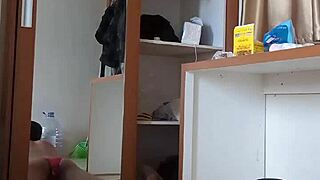 Sexy gay in red cd and mask plays with toys