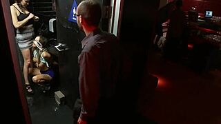 Busty slave takes a piss in the men's room