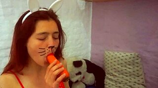 Sexy girl enjoys her boyfriend playing with a favorite carrot