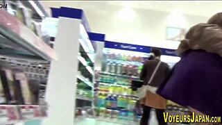 Asian babe in pantyhose followed by sneaky voyeur in public