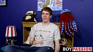 red-haired guy chats before diving into solo toy play with huge dildo