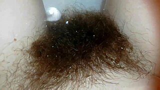 Hairy bush shines underwater in unique fetish close-up video. A rare tight view awaits.