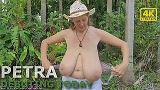 Busty Nudist MILF Petra Stuns with Raw Beach Exposure