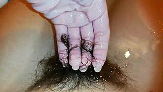 Hairy bush shines underwater in unique fetish close-up video. A rare tight view awaits.